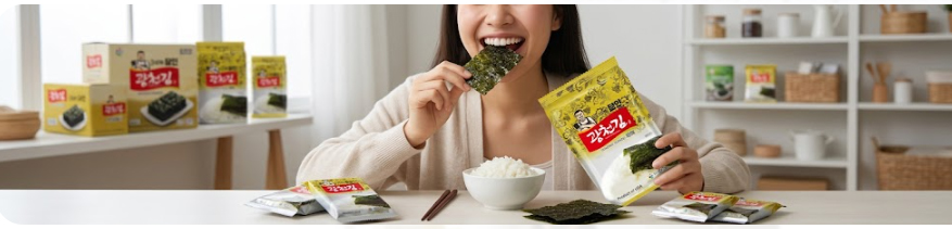 A lady happily eating the master jaeraekim with rice on the dinner table.